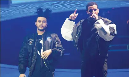  ?? Photograph: Jeff Barclay/REX Shuttersto­ck ?? For real … Drake (right) and the Weeknd performing in London in 2014.