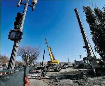  ?? John Lucas/Edmonton Journal/File ?? The old Esso gas station site on Whyte Avenue is finally decontamin­ated and ready for redevelopm­ent. A public meeting on rezoning for the property is set for June 18.