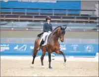  ?? ?? Maryam Ahmed Alsemaitt in action during the Hathab dressage event at Al Shaqab on Thursday.