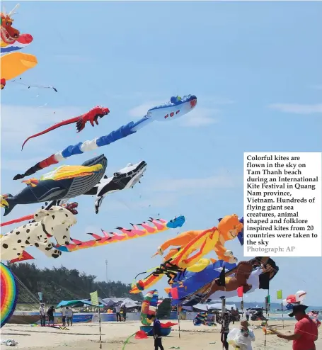  ??  ?? Colorful kites are flown in the sky on Tam Thanh beach during an Internatio­nal Kite Festival in Quang Nam province, Vietnam. Hundreds of flying giant sea creatures, animal shaped and folklore inspired kites from 20 countries were taken to the sky...