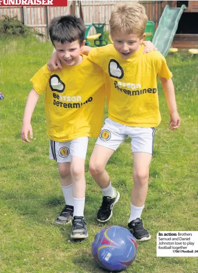  ?? 170617foot­ball_04 ?? In action Brothers Samuel and Daniel Johnston love to play football together