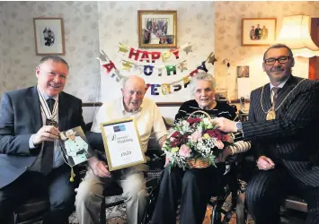  ??  ?? Happy anniversar­y
Maisie and Arthur with depute Lieutenant David Russell and Provost Ian McAllan