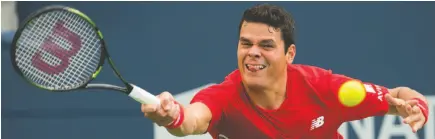  ?? CP PHOTO ?? Milos Raonic returns the ball against Yen-Hsun Lu of Taiwan during men’s second round Rogers Cup tennis action in Toronto on Wednesday.