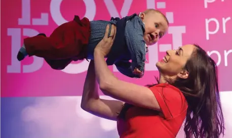  ?? Photo: Stephen Collins/Collins Photos ?? Wendy Grace pictured with her son Matthew (nine months) at the Pro-Life Campaign’s National Conference at the RDS in Dublin.