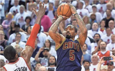  ?? DAN HAMILTON, USA TODAY SPORTS ?? Guard J.R. Smith, right, shot a combined 9-for-26 on three-pointers in the Cavaliers’ Games 3 and 4 losses to the Raptors. Overall in the series, Cleveland has hit 33.3% of its three-point attempts.