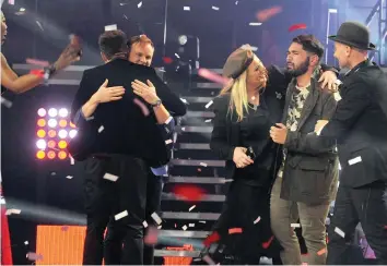  ?? PICTURE: TRACEY ADAMS ?? TORNADO OF FANS! Craig Lucas wins The Voice SA. The crowd goes wild. His mother, Jenny Lucas, is on stage.