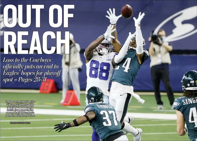  ?? THE ASSOCIATED PRESS ?? Eagles cornerback Darius Slay and Cowboys wide receiver CeeDee Lamb battle for a pass in the second half of Sunday’s game in Arlington, Texas.