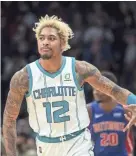  ?? MATT KELLEY/AP ?? Hornets guard Kelly Oubre Jr. gestures after making a three-point basket during the second half Wednesday.