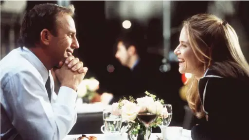  ?? UNIVERSAL/TIG PRODUCTION­S ?? Kevin Costner and Kelly Preston are shown in a scene from the 1999 film “For Love of the Game.”