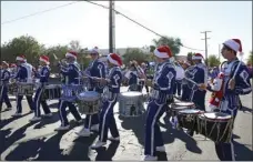  ?? WILLIAM ROLLER PHOTO ?? The Great Spartan Band drum line at the 71st El Centro Christmas Parade.