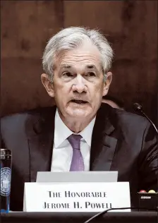  ?? DREW ANGERER/GETTY ?? Federal Reserve Board Chairman Jerome Powell notes that economic recovery has slowed in recent months.