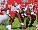  ?? COURTESY OF KEVIN SNYDER ?? UGA center Trey Hill had arthroscop­ic surgery on both knees this week and will miss the rest of the season.