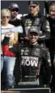  ?? MATT SLOCUM — THE ASSOCIATED PRESS ?? Martin Truex Jr., bottom, celebrates after winning the NASCAR Cup Series auto race, Sunday in Watkins Glen, N.Y.
