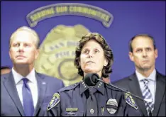  ?? GREGORY BULL / AP ?? San Diego Police Chief Shelley Zimmerman (center) is flanked by San Diego Mayor Kevin Faulconer (left) and police Capt. David Nisleitand at a Friday news conference in San Diego after police arrested a suspect in a series of assaults on the city’s...