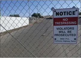  ?? ?? A locked gateway at Silver Dollar Way in Chico, to the entrance of the Silver Dollar BMX Race Track warns trespasser­s Wednesday.