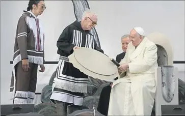  ?? Gregorio Borgia Associated Press ?? POPE FRANCIS meets with members of the Inuit community in Iqaluit, Canada, on Friday. The pope spent a week traveling Canada on a “penitentia­l pilgrimage” to atone for abuses at church-run residentia­l schools.