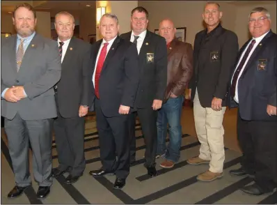  ??  ?? Scott Bradley, Arkansas Sheriffs’ Associatio­n director, with sheriffs Mike Loe, Columbia County; Doc Holladay, Pulaski County; Phil Reynolds, Woodruff County; Jeff Yates, Lawrence County; David Carter, Green County; and Terry Miller, Clay County