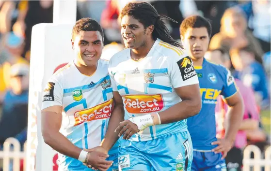  ?? Picture: GREGG PORTEOUS ?? Jamal Idris (right) celebrates after scoring one of his two tries against Parramatta at Mudgee.