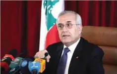  ?? — AFP ?? BEIRUT: Lebanese President Michel Sleiman delivering a statement during a tour at the Defense ministry in Yarze, east of Beirut, yesterday. Sleiman cautioned Shiite Muslim group Hezbollah over its militants’ interventi­on on the side of Bashar...