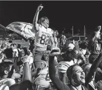  ?? Photos by Sam Grenadier / Contributo­r ?? New Braunfels players celebrate Friday’s bidistrict playoff victory over Johnson — the Unicorns’ first since 2009.