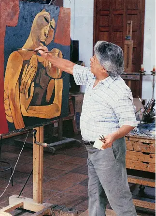  ??  ?? Oswaldo Guayasamín trabaja en una pintura.