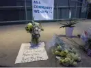  ?? Photograph: Xinhua/REX/Shuttersto­ck ?? Flowers are placed to mourn victims of the shootings in Half Moon Bay in California on Tuesday.