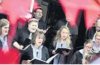  ??  ?? ●●The Menorah Synagogue Choir singing at Cheadle Hulme School.