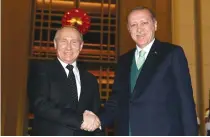  ??  ?? RUSSIAN PRESIDENT Vladimir Putin meets with his counterpar­t Tayyip Erdogan in Ankara yesterday.