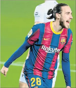  ?? LLUÍS GENÉ / AFP ?? Mingueza celebra el gol que li va marcar al Huesca
