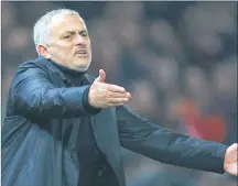  ?? AP PHOTO ?? In this Wednesday Dec. 5, photo Manchester United’s coach Jose Mourinho gives directions to his players during the English Premier League soccer match between Manchester United and Arsenal at Old Trafford stadium in Manchester, England.