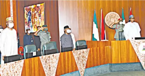  ??  ?? L-R: Boss Mustapha, secretary to the government of the federation, Vice President Yemi Osinbajo and President Muhammadu Buhari during a virtual meeting of the Federal Executive Council at the Presidenti­al Villa in Abuja yesterday. NAN