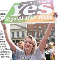  ??  ?? victory: A pro-repeal campaigner celebrates at Dublin Castle yesterday