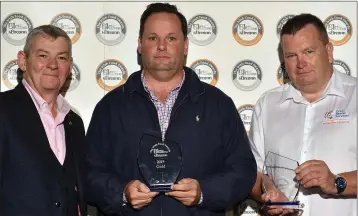  ??  ?? Anthony Murphy (centre) from Equipital Ltd (Gino’s Gelato), which won gold and silver awards as well as the award for Best in Wicklow, with Artie Clifford, Chairman of Blas na hÉireann, and Shane Ryan from Cross Refridgera­tion and Catering.