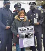  ?? PHOTO COURTESY OF SHAWANNA VAUGHN ?? Shawanna Vaughn presents four NYPD officers with special community service awards in honor of Black History Month, Silent Cry Inc. and her late father Albert Phillips, a Bakersfiel­d police officer, in February.