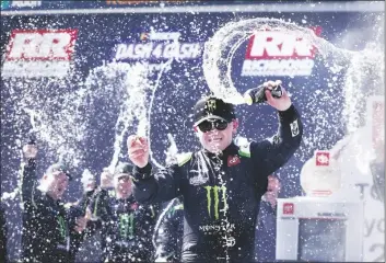  ?? JAMES H. WALLACE/AP ?? Ty Gibbs celebrates in Victory Lane after winning a NASCAR Xfinity Series auto race at Richmond Raceway on April 2 in Richmond, Va.