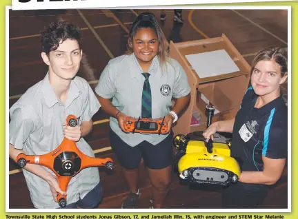  ?? Picture: KELSIE IORIO ?? Townsville State High School students Jonas Gibson, 17, and Jameliah Illin, 15, with engineer and STEM Star Melanie Olsen from the Australian Institute of Marine Science.