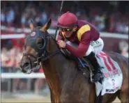  ?? ADAM MOOSHIAN/NYRA ?? Travers Winner Catholic Boy with jockey Javier Castellano aboard winning the 2018Traver­s at Saratoga Race Course.