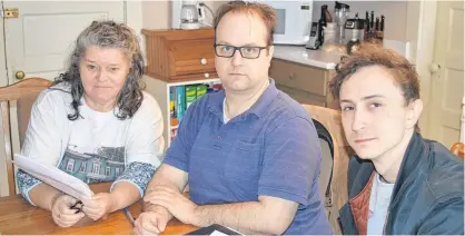  ?? DAVE STEWART/THE GUARDIAN ?? Marlene Gallant, left, Dave Neatby and Dylan Menzie are three of the nine tenants who are being evicted from an apartment building at 24 Water St. in Charlottet­own because the building owner says there are asbestos issues in the plaster walls. He also wants to construct a new building next door and complete renovation­s to the existing apartment building.