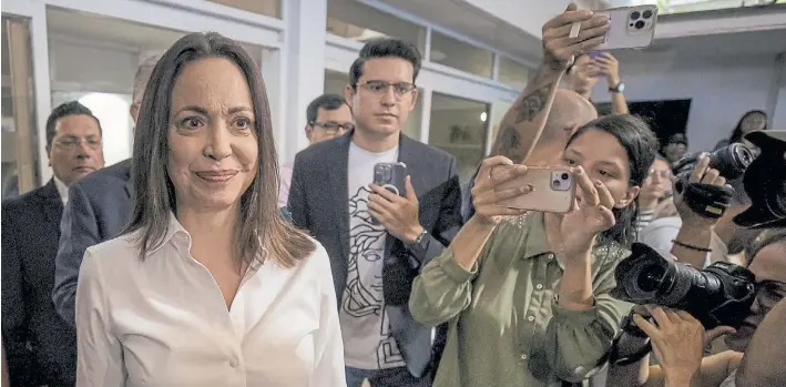  ?? EFE ?? Tensión. Con rostro agotado, la líder opositora María Corina Machado en el momento que denunció el arresto de los principale­s líderes de su partido y de su campaña.
