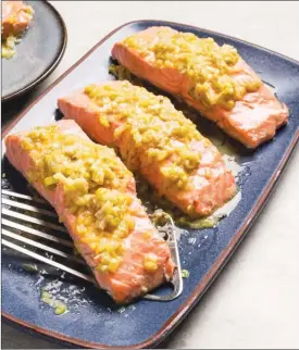  ?? The Associated Press ?? This recipe for Salmon with Leeks and White Wine appears in the cookbook How to Braise Everything.