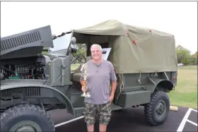  ?? SUBMITTED PHOTO ?? Retired TCHS Brandywine Automotive Collision Instructor, Mark Serfass, returns to the TCHS Car Show and receives the first place military vehicle trophy for his 1943 Internatio­nal MQ4.