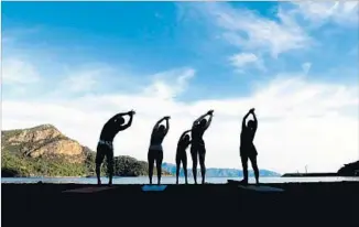  ?? Sun Fun You ?? REACH FOR the sky during a workout while on the Sun Fun You’s Mediterran­ean fitness cruise.