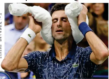  ??  ?? Blinding heat: Djokovic uses an ice towel during his win over Millman