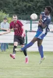  ??  ?? Sam Bull in action for Billingshu­rst in the FA Vase Pic: Iain Gibson