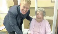  ??  ?? Adam Henson with fan Muriel Pearson during his visit to Prestbury House Care Home