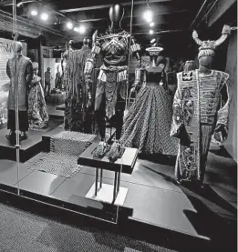  ?? KEITH SRAKOCIC/AP ?? Designs from “Black Panther” are part of a new exhibit of costumes in Pittsburgh.