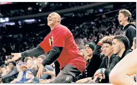  ?? N.Y. Post: Charles Wenzelberg ?? FRONT AND CENTER: LaVar Ball and his family look on from their floor seats during Tuesday’s game.