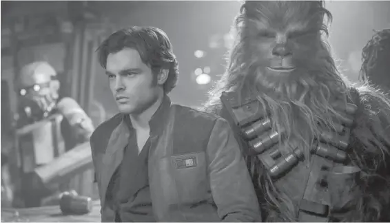  ?? LUCASFILM ?? Alden Ehrenreich as Han Solo, with Chewbacca (Joonas Suotamo), in Solo: A Star Wars Story. The movie’s original directors were replaced.