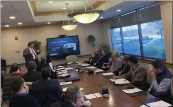  ?? PHOTO COURTESY CHESTER COUNTY ECONOMIC DEVELOPMEN­T COUNCIL ?? In this photo, a presentati­on is given during a meeting of the Pennsylvan­ia Global Business Advisors board, formed by the Chester County Economic Developmen­t Council.