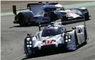  ??  ?? Brendon Hartley on his way to victory in the Nurburgrin­g Six-hour race, driving a factory Porsche.